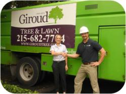 Missy Di Massa, Abington YMCA Associate Executive Director with Rob Nagy, Giroud Arborist Representative as the Giroud tree removal crew gets set up to remove a hazardous locust tree.